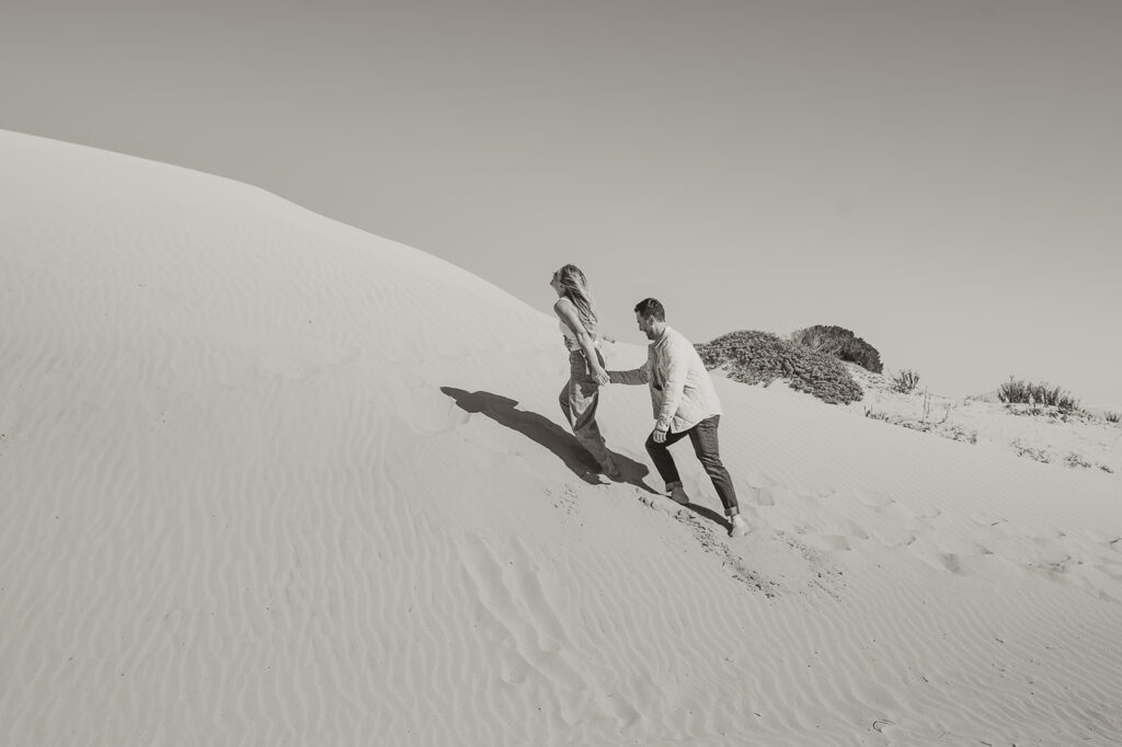 couple walking at the beach 