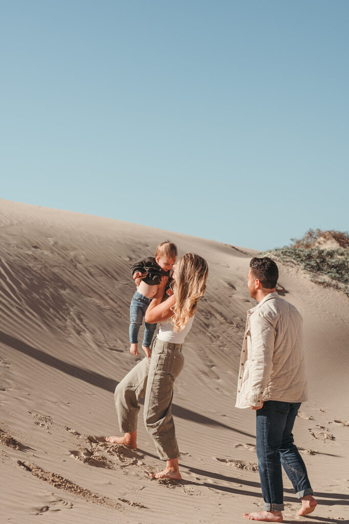 Family walking at the beach 