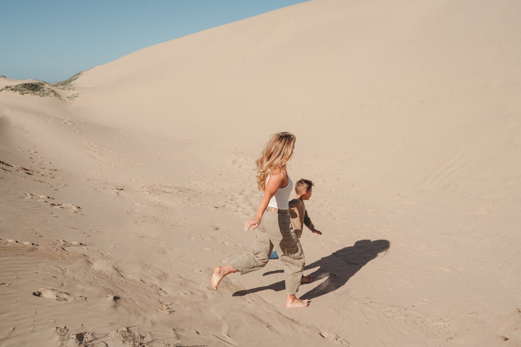 family running at the beach 