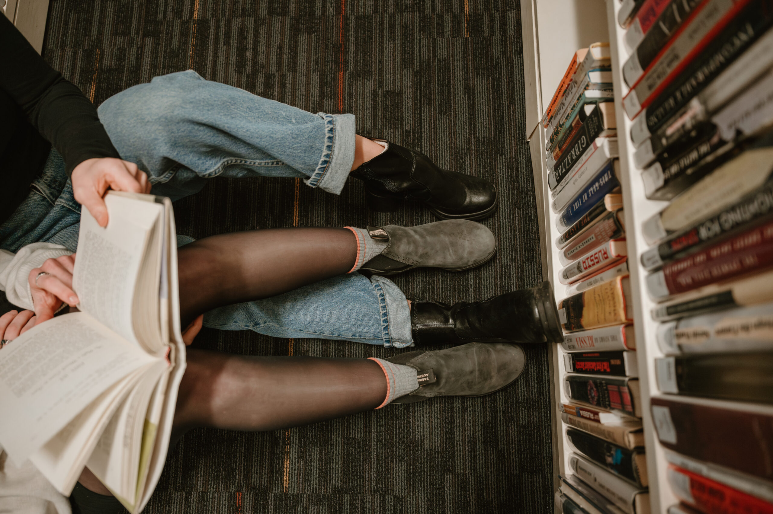 couple reading a book together 