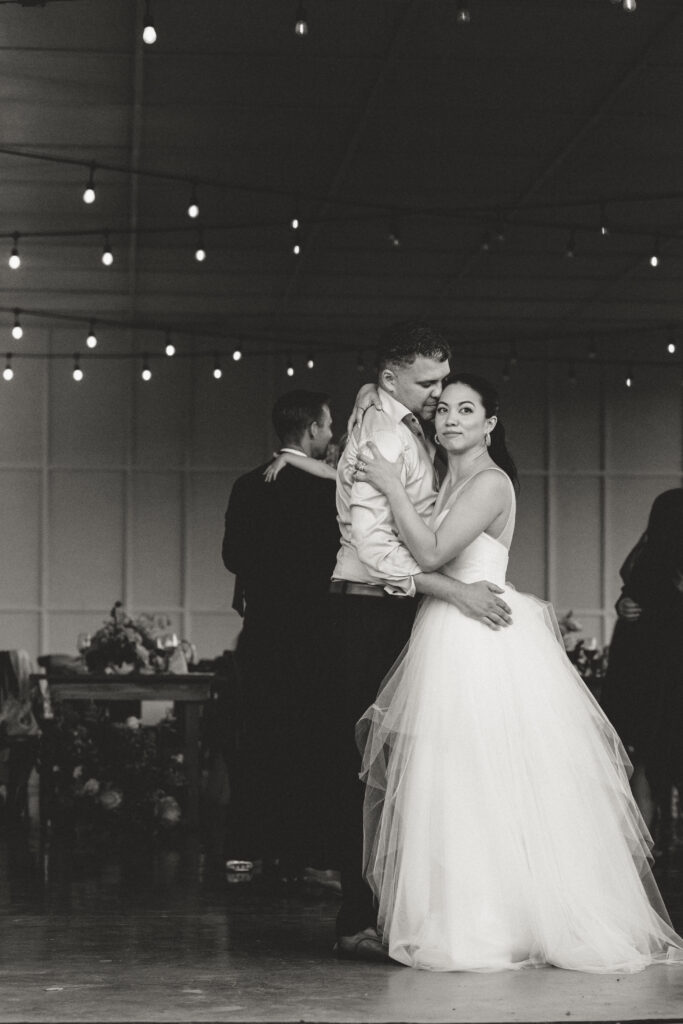 bride and groom dancing for their first dance at their wedding at the orchard in hood river 