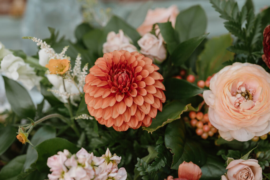 dahlias in wedding centerpiece and pink flowers