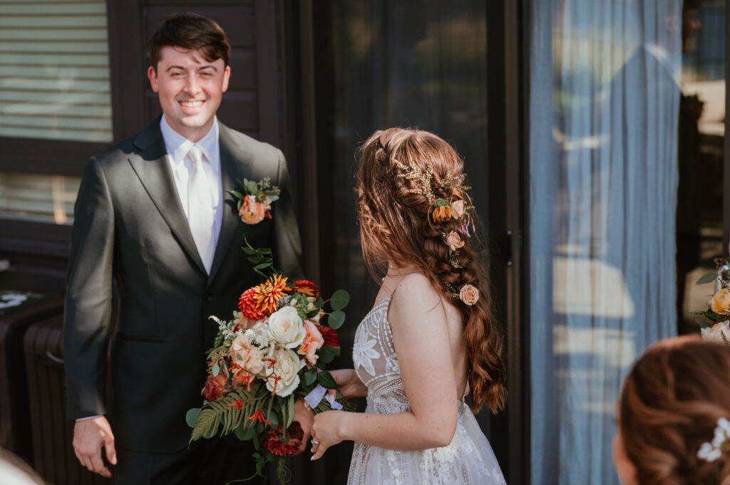 bride and groom celebrating together after ceremony 