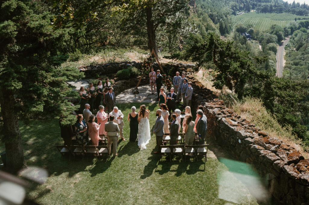 bride walking down the aisle with her mother 