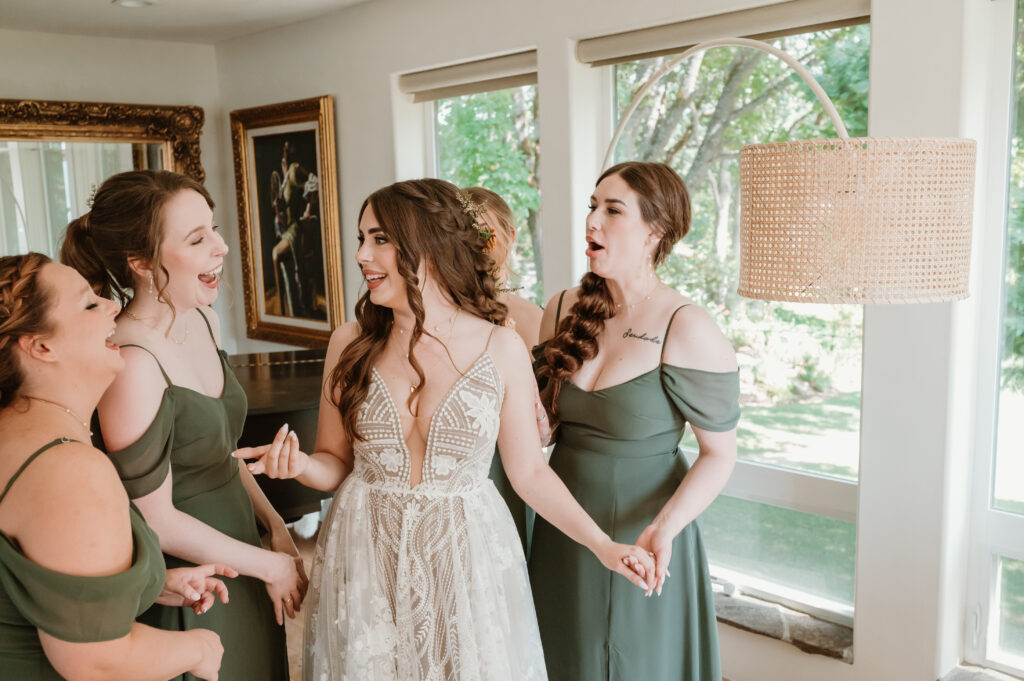 brides first look with bridal party 