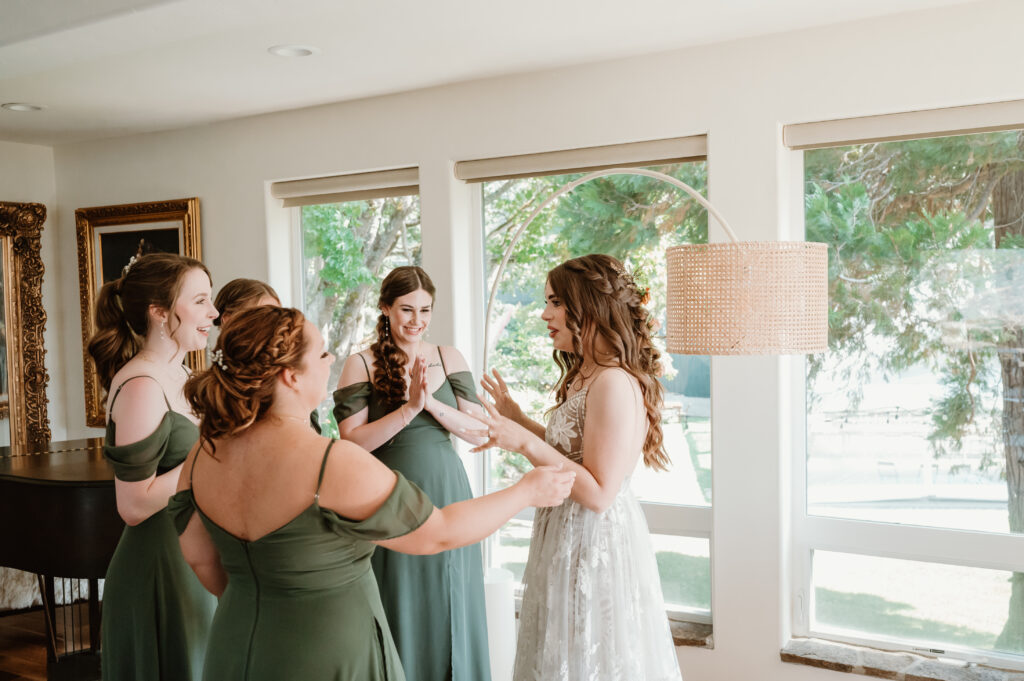 brides first look with bridal party 