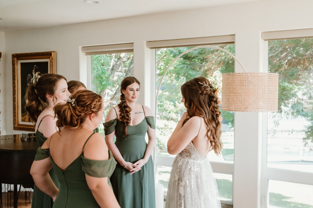 brides first look with bridal party 