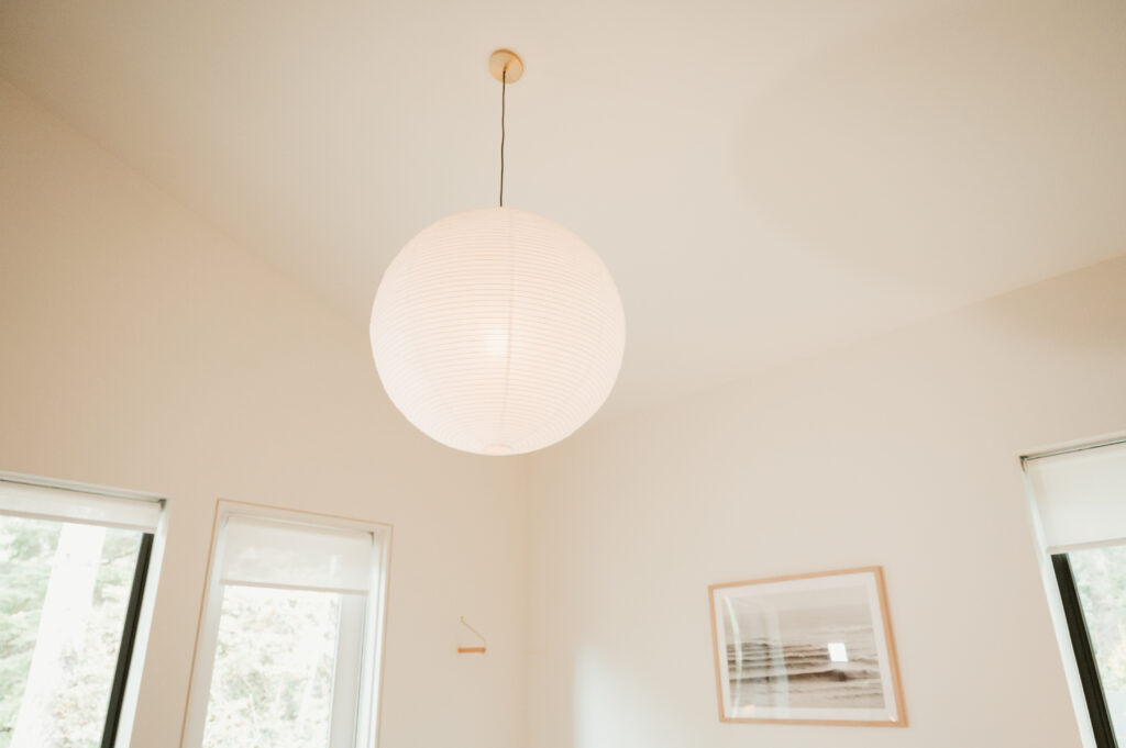 details of the lamp and art in the getting ready suite 