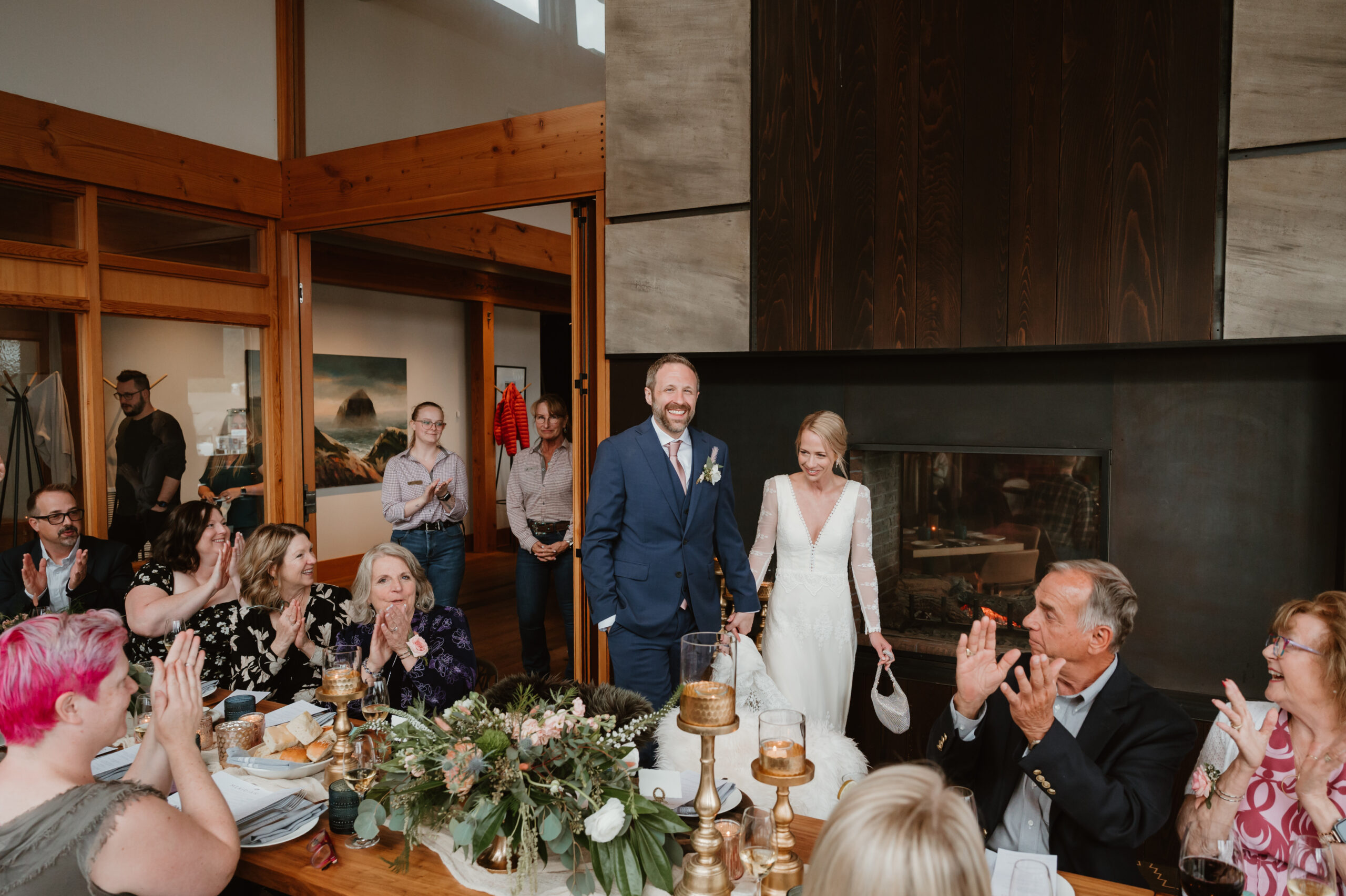 Couple walking into their intimate elopement dinner after they get married