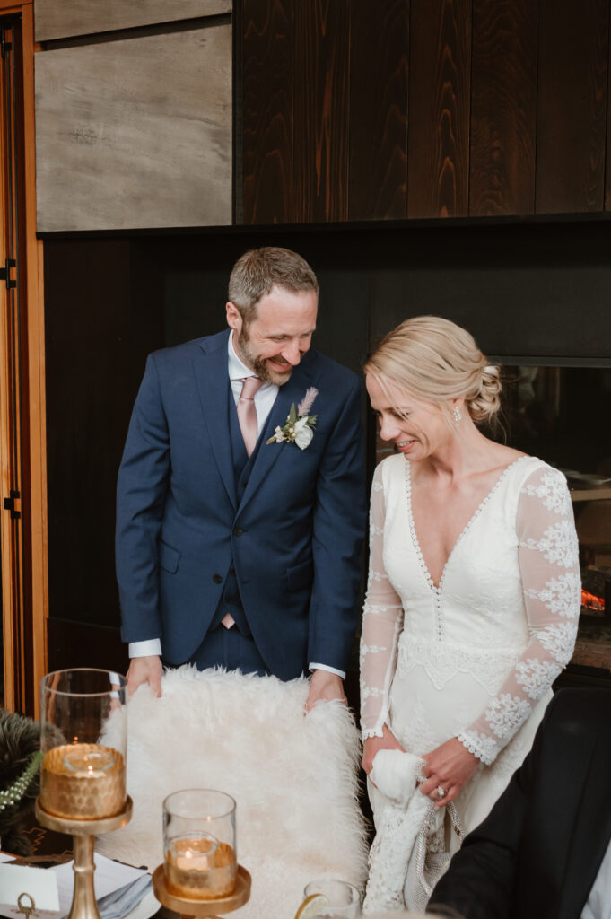 groom looking and smiling at the bride at their intimate oregon coast wedding 